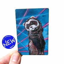 Load image into Gallery viewer, small wood rectangle fridge magnet, hand painted with a portrait of an fluffy ferret, posing in front of a retro 80s / 90s blue background with blue and pink lasers
