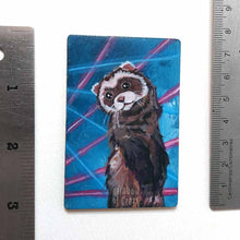 Load image into Gallery viewer, small wood rectangle fridge magnet, hand painted with a portrait of an fluffy ferret, posing in front of a retro 80s / 90s blue background with blue and pink lasers
