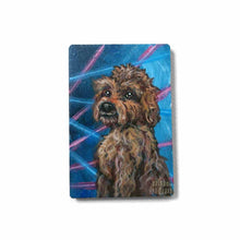 Load image into Gallery viewer, small wood rectangle fridge magnet, hand painted with a portrait of an apricot / brown Labradoodle dog, posing in front of a retro 80s / 90s blue background with blue and pink lasers
