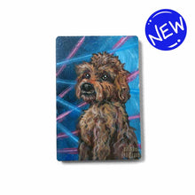 Load image into Gallery viewer, small wood rectangle fridge magnet, hand painted with a portrait of an apricot / brown Labradoodle dog, posing in front of a retro 80s / 90s blue background with blue and pink lasers
