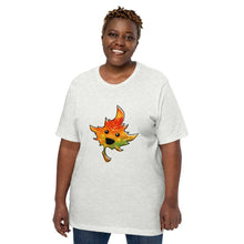 Load image into Gallery viewer, person wears a t-shirt in the colour ash (light grey) featuring a smiling maple leaf

