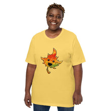 Load image into Gallery viewer, person wears a t-shirt in the colour yellow, featuring a smiling maple leaf
