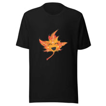 Load image into Gallery viewer, t-shirt in the colour black, featuring a graphic of a smiling maple leaf

