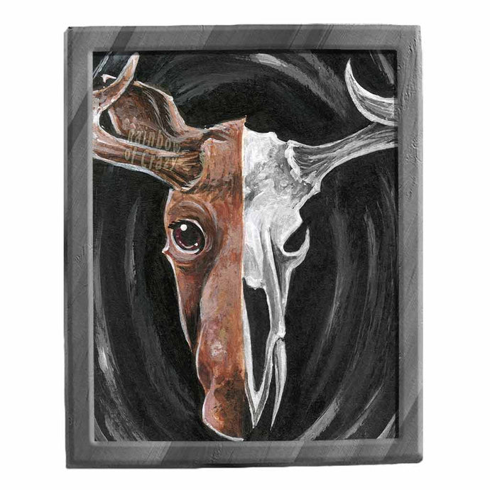 An art print split into two images: the left side, a moose's face, and the right side, a moose skull.