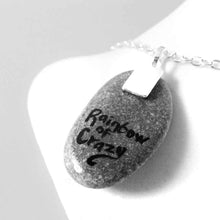 Load image into Gallery viewer, a small beach stone, hand painted with a little brown and white mouse as an angel in the clouds, with a halo and wings. the stone is available as a keepsake rock art or as a pendant necklace. back is signed with rainbowofcrazy
