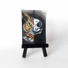 Load image into Gallery viewer, an aceo sized painting, split into two sides, a great horned owl&#39;s face on the left and a creepy owl skull on the right.
