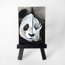 Load image into Gallery viewer, an aceo sized painting, split into two sides, a pandas face on the left and a creepy panda skull on the right. 

