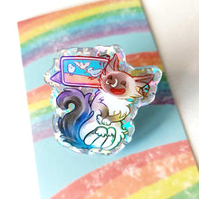 Load image into Gallery viewer, acrylic pin of a smiling ragdoll cat watching birds on a tablet.
