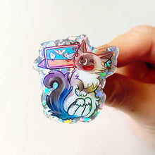 Load image into Gallery viewer, acrylic pin of a smiling ragdoll cat watching birds on a tablet.
