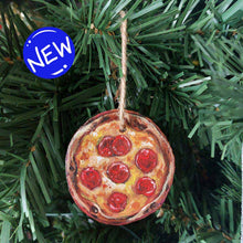 Load image into Gallery viewer, wood ornament hanging on a christmas tree, painted to look like a pepperoni pizza
