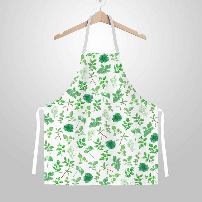 The Plant Lovers Apron, a white apron printed with a variety of garden plants