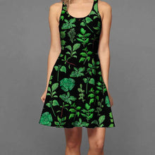 Load image into Gallery viewer, a woman wearing the Plant Lovers Black Dress, a skater style dress featuring an all over print, illustrated with a variety of plants from the garden
