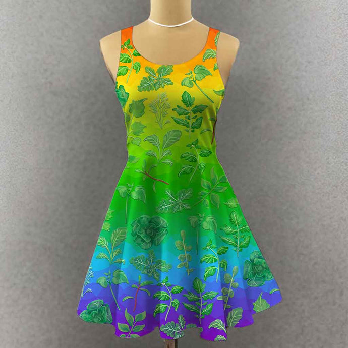 the Plant Lovers Rainbow Dress, a skater style dress in a rainbow gradiant, llustrated with a variety of plants from the garden