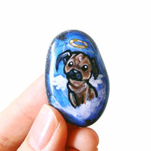 Load image into Gallery viewer, Named &quot;Bug the Pug&quot;, a beach rock is painted with dog art of a pug as an angel, available as either a keepsake gift , fridge magnet, or pendant necklace
