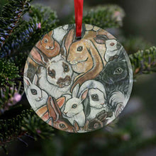 Load image into Gallery viewer, a round glass ornament, printed with a collage of different rabbit breeds
