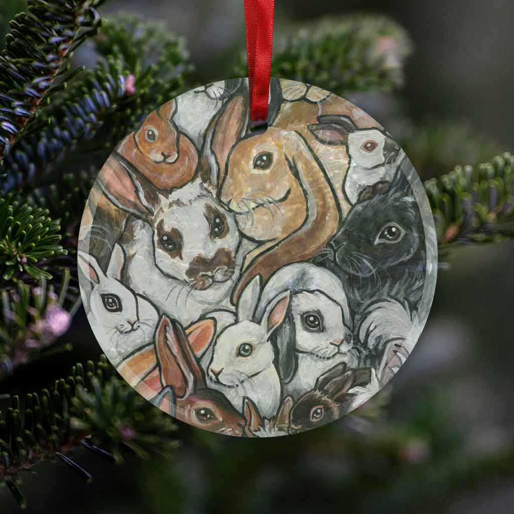 a round glass ornament, printed with a collage of different rabbit breeds