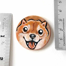 Load image into Gallery viewer, small wood disc painted with a smiling Shiba inu&#39;s face. available as a keepsake or pendant necklace 
