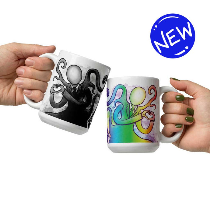 one hand holding a 15 oz white ceramic mug with an illustration of Slender Man forming a heart with his hands. a second hand is holding a second mug, showing it from the other side, featuring the same illustration, mirrored, in all the colours of the rainbow.
