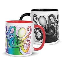 Load image into Gallery viewer, The 11 oz Slender Man Love Mug with Colour: white ceramic mug with an illustration of Slender Man forming a heart with his hands, in all the colours of the rainbow, with a red handle and red interior. behind that a second mug, showing it from the other side, featuring the same illustration, mirrored, in black and white. mug has a black interior and black trim.
