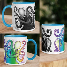 Load image into Gallery viewer, The 11 oz Slender Man Love Mug with Colour: white ceramic mug has a blue interior and handle, with an illustration of Slender Man forming a heart with his hands, in all the colours of the rainbow. collage shows mug from different angles. on the other side of the mug is the same illustration, mirrored, in black and white. 
