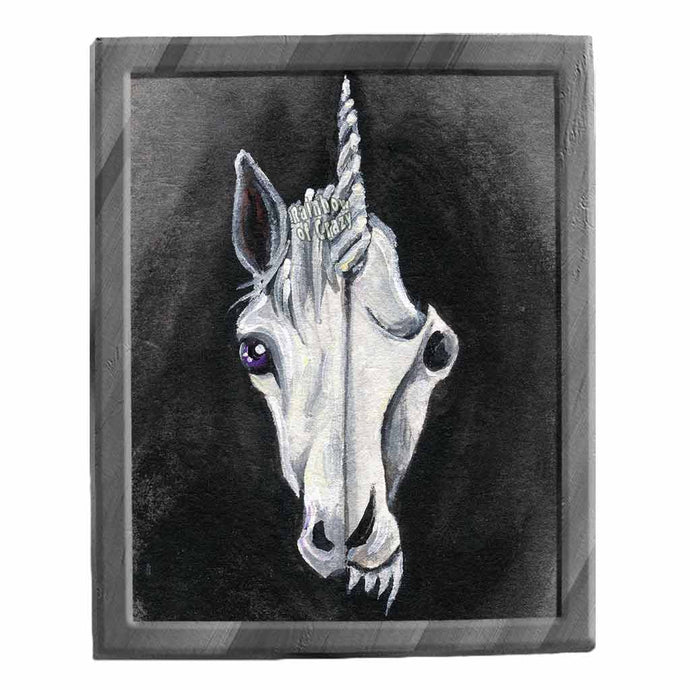 an illustration of a unicorn, split into two sides. the left side features half ot he unicorn's face, while the right side reveals its eerie skull. available as an art print