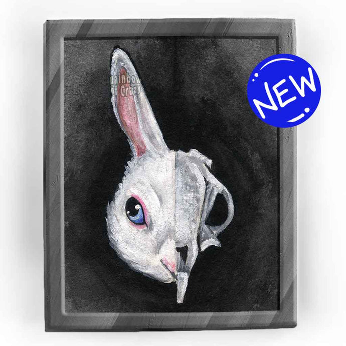 an art print featuring an illustration of a white rabbit's face. the image is split into two sides: the right side revealing the rabbit's skull.