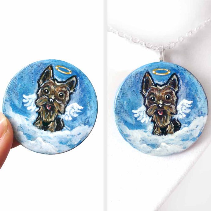 a small wood circle, hand painted with a portrait of an yorkshire terrier dog as an angel in the clouds, with a halo and wings