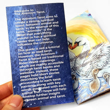 Load image into Gallery viewer, The back of the Animism Tarot booklets includes a small introduction to this animal world.
