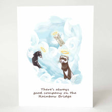 Load image into Gallery viewer, A greeting card with three ferret angels on top of the clouds. The card reads, &quot;There&#39;s always good company on the Rainbow Bridge&quot;

