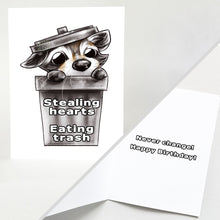 Load image into Gallery viewer, a greeting card with art of a baby raccoon peeking out from a garbage can. the card reads, &quot;stealing hearts. eating trash&quot; on the front and &quot;never change! happy birthday!&quot; on the inside
