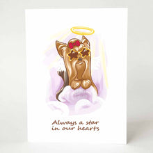 Load image into Gallery viewer, A greeting card with an illustration of a Yorkshire Terrier as an angel, wearing star shaped sunglasses and a red bow on its head, it sits on purple clouds. The card reads, &quot;Always a star in our hearts&quot;
