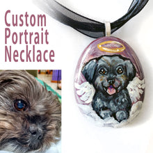 Load image into Gallery viewer, A custom dog portrait necklace, crafted from a small beach rock, includes art of a black and brown Affenpinscher
