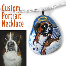 Load image into Gallery viewer, A personalized pet portrait necklace, painted on a beach stone, of a boxer dog as an angel.

