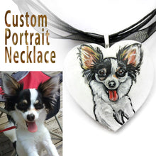 Load image into Gallery viewer, a personalized dog portrait of a black and white papillon, painted on a heart shaped wood pendant and handmade into a necklace
