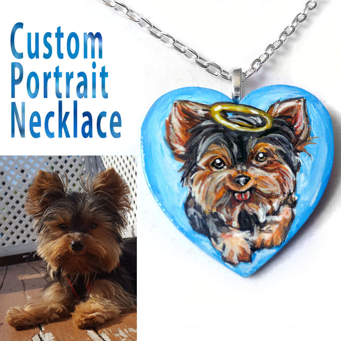 A custom portrait necklace, of a yorkshire terrier painted as an angel, on a heart shaped wood pendant.