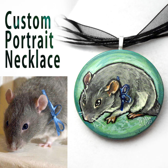 A custom pet portrait painting, on a circle wood necklace, of a grey mouse wearing a blue ribbon