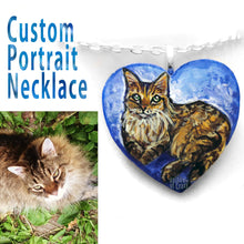 Load image into Gallery viewer, a wood heart custom painted blue with a brown and orange cat, handmade into a necklace

