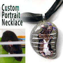 Load image into Gallery viewer,  A custom pet portrait necklace, painted on a beach stone, of a brown and white rat climbing up cage bars.
