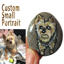 Load image into Gallery viewer, a small beach pebble with custom art of a yorkshire terrier dog

