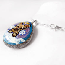 Load image into Gallery viewer, a pendant necklace, handmade with a beach rock, with portrait art of a french bulldog  as an angel in the clouds
