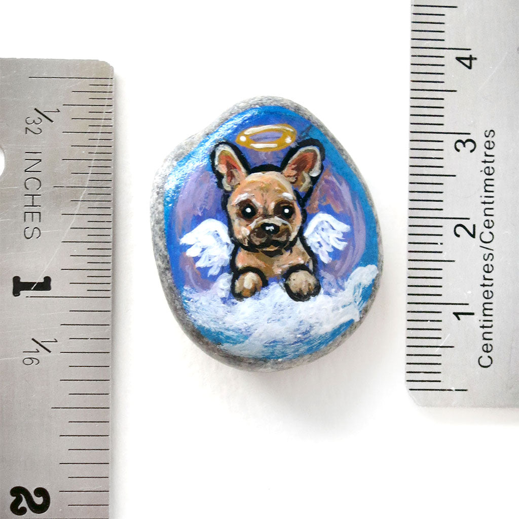 the french bulldog angel portrait stone, next to two rulers to show its size: 1 1/2