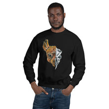Load image into Gallery viewer, A man is wearing a unisex sweatshirt in the colour black, printed with an image split into two: the left side features the face of a brown alpaca, and the right side features an evil looking alpaca skull.
