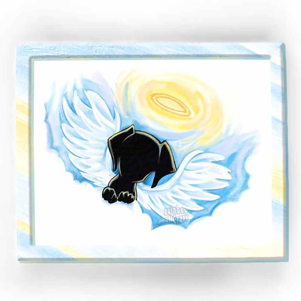 An art print of black dog in silhouette, painted as an angel with halo and wings, peeking out from behind the clouds.