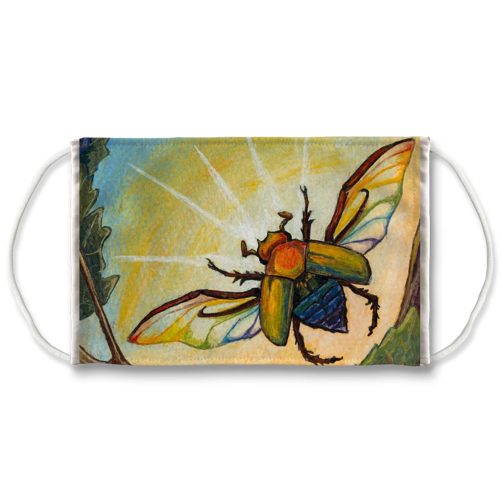 A reusable face mask features a scarab in rainbow colours, taking flight in front of the sun. Art is from the Ace of Pentacles card from the Animism Tarot