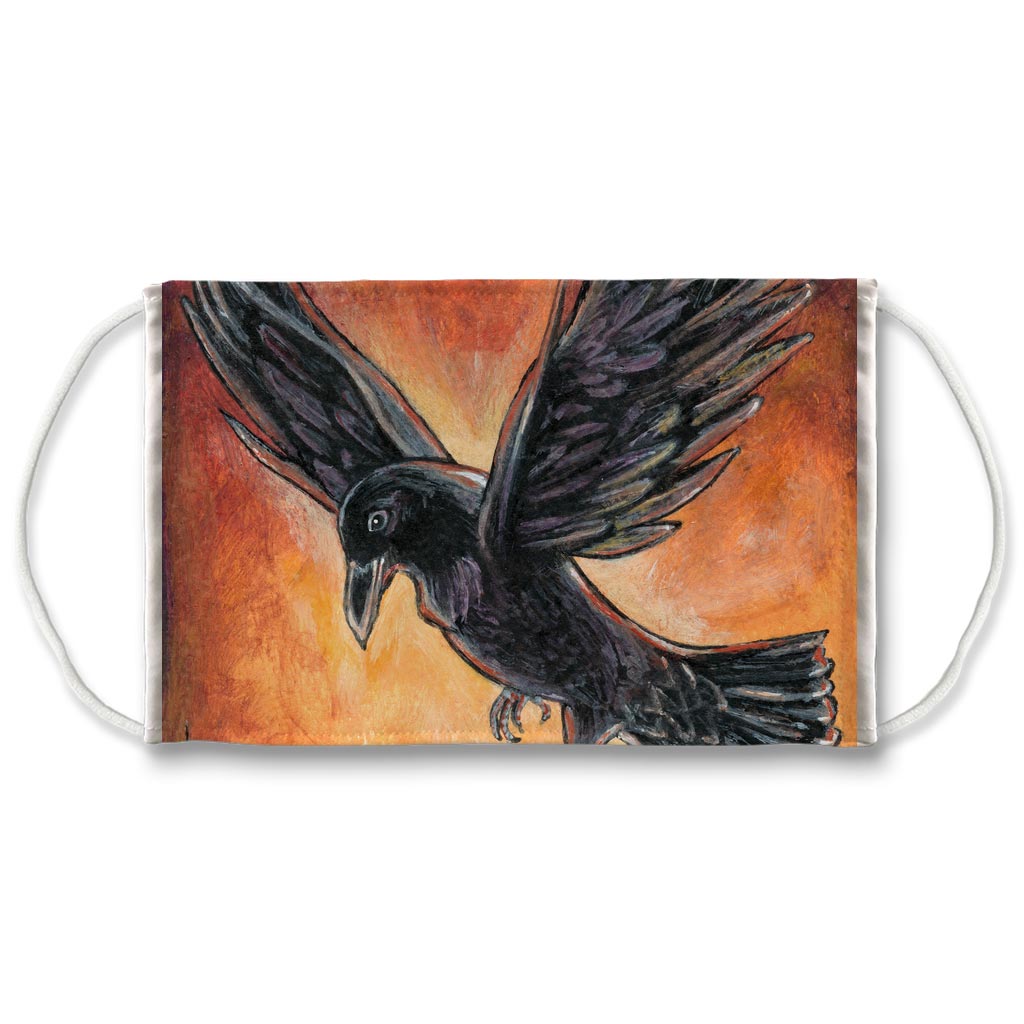 A reusable face mask featuring a raven bird flying in front of a red and orange sky. Art is from the Death card from the Animism Tarot