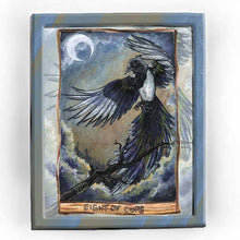 Load image into Gallery viewer, An art print of the Eight if Cups from the Animism Tarot, which features a magpie rising from a tree branch and leaving its home for the last time.
