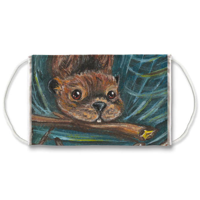 A reusable face mask features art of a swimming beaver, carrying a branch in its mouth