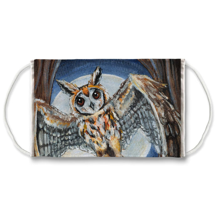 A reusable face mask featuring art of an owl flying in front of a full moon. Art is from the High Priestess card in the Animism Tarot