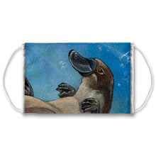 Load image into Gallery viewer, A reusable face mask featuring a platypus swimming underwater. Art is from the Page of Cups from the Animism Tarot
