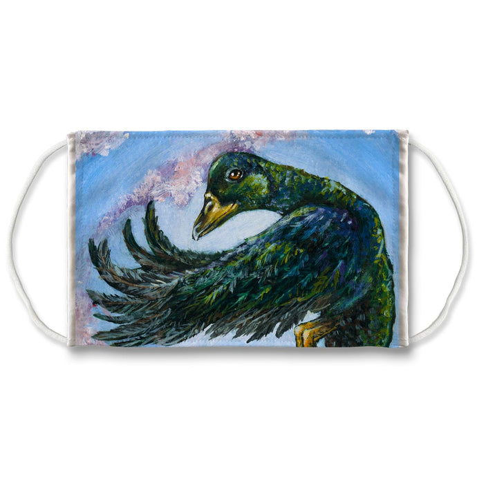 A reusable face mask featuring art of a cayuga duck flying. Art is from the Animism Tarot